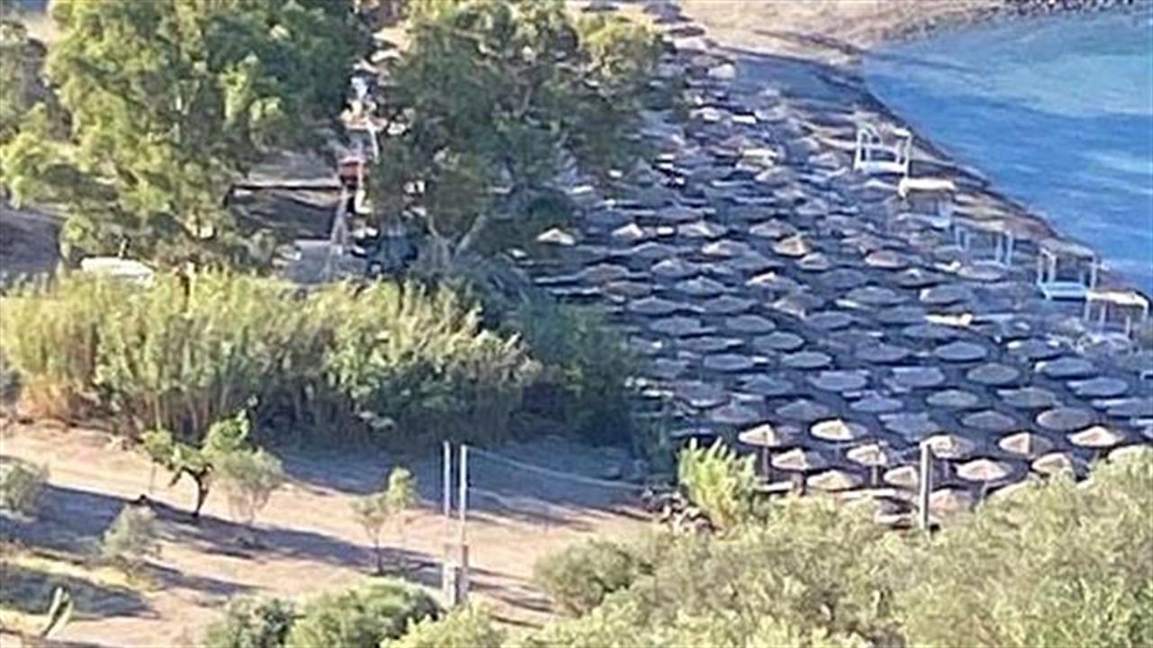 Επιχειρηματίας στην Αίγινα έβαλε 140 ομπρέλες σε παραλία, ενώ έχει άδεια για 24 σετ